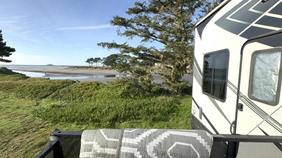 Our site at Lighthouse Cove RV Park backing up to the estuary