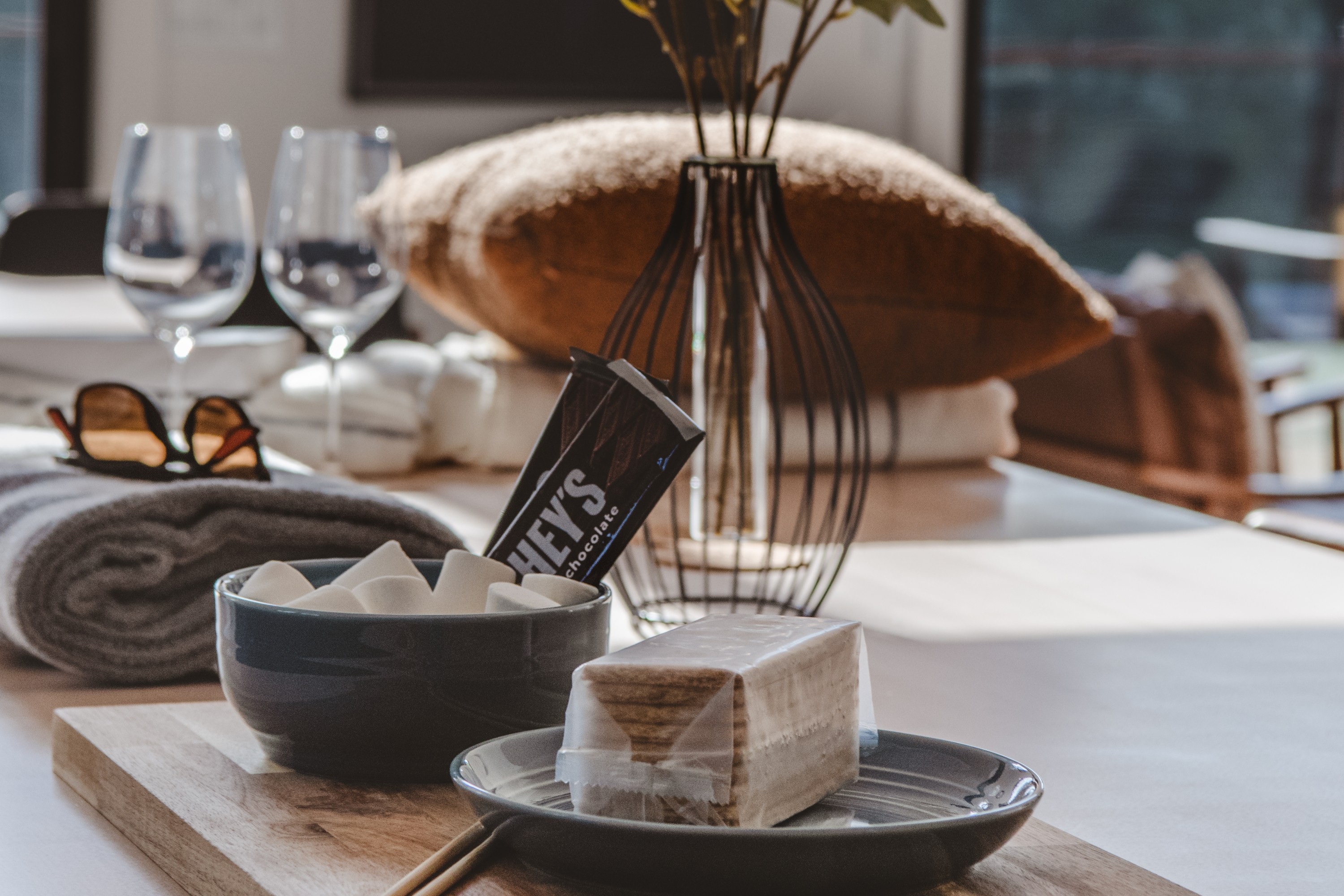 S’mores and chocolate arranged for a cozy lodge evening