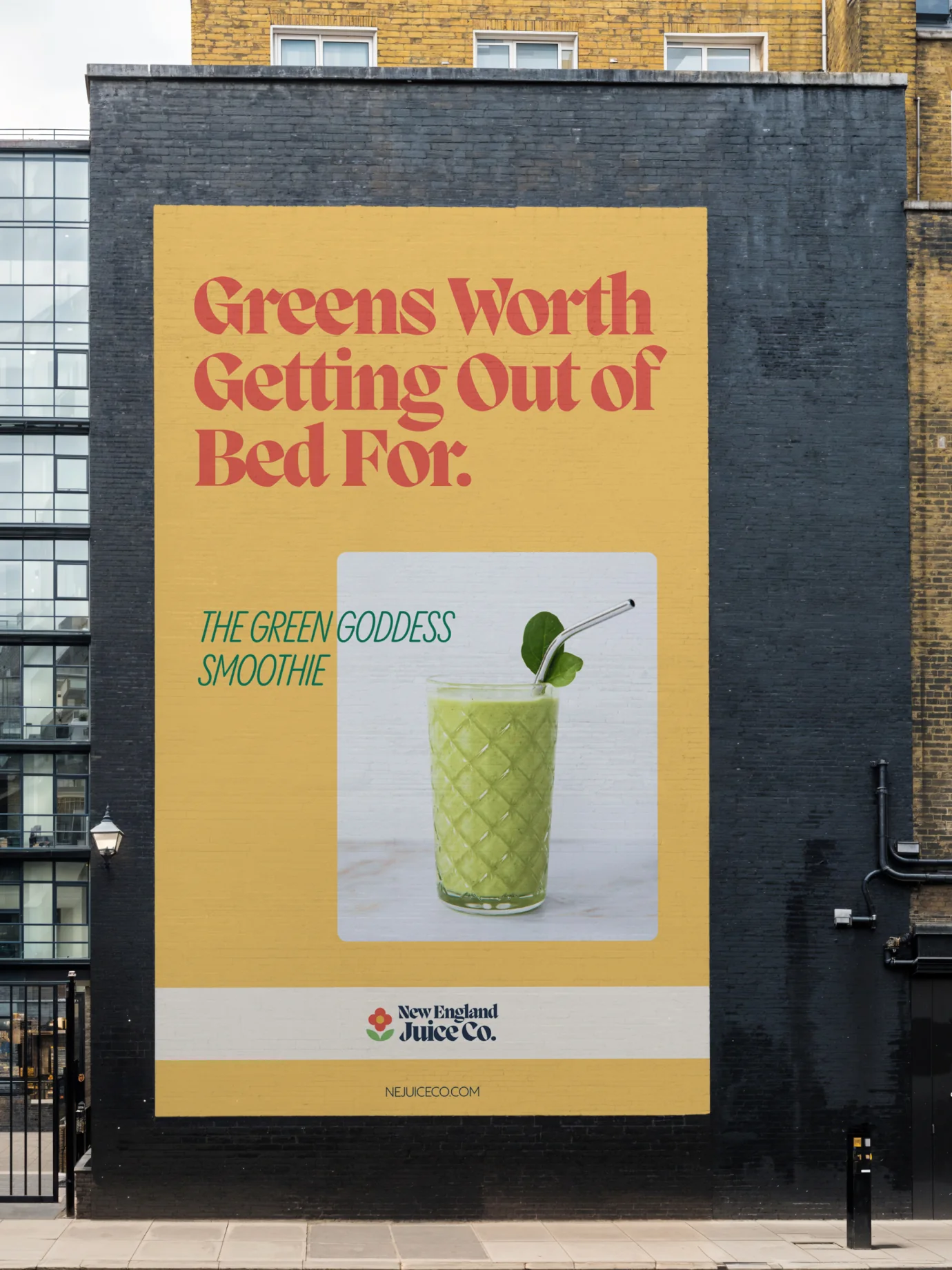 New England Juice Co. — Oversized wall advertisement on brick building — Outdoor campaign