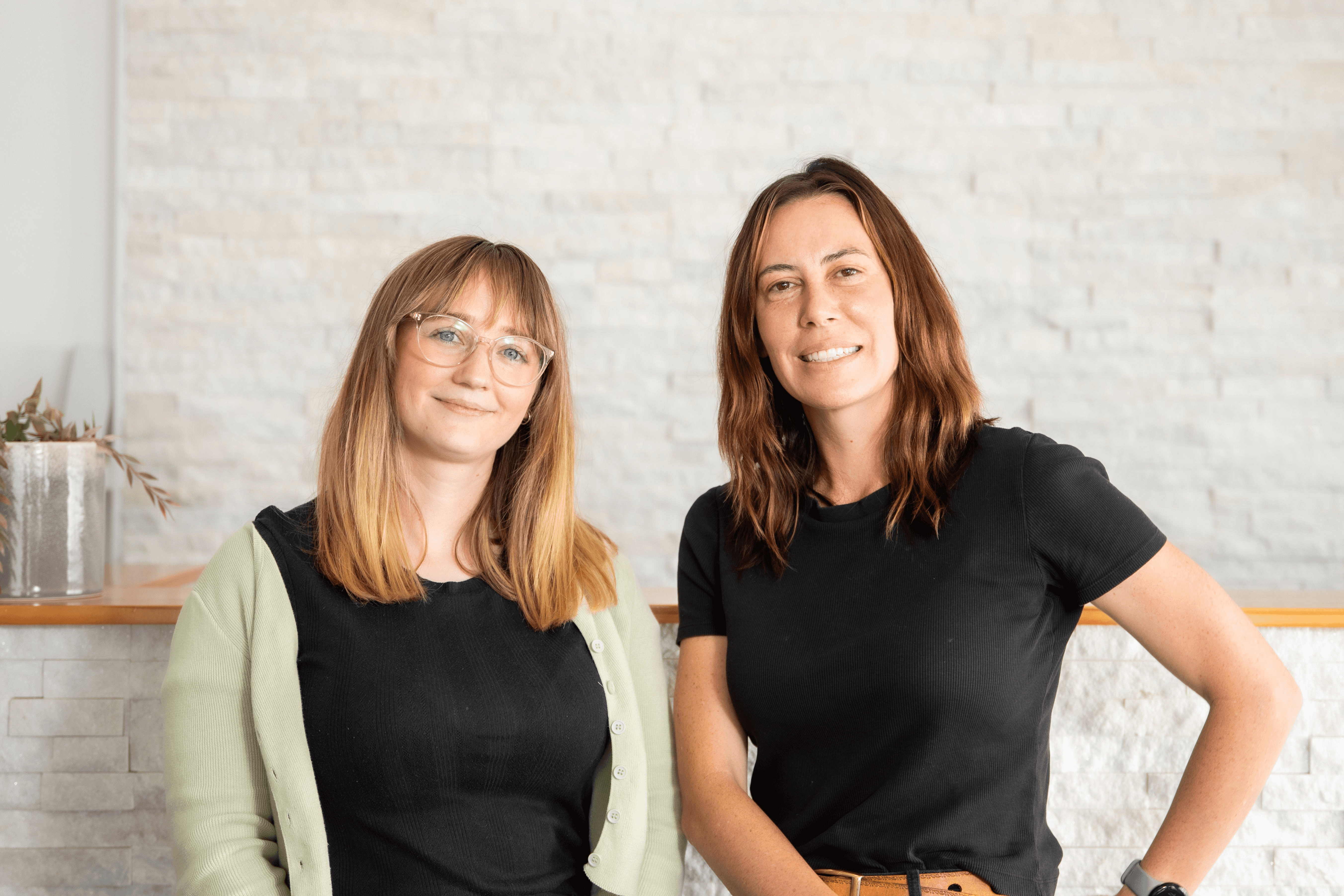 Pregnant woman's belly illuminated by sunlight.