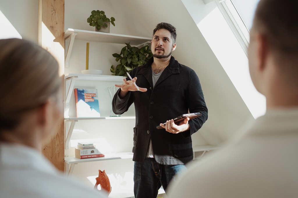 Storyos founder reviewing brand strategy material in a StoryOS clarity session