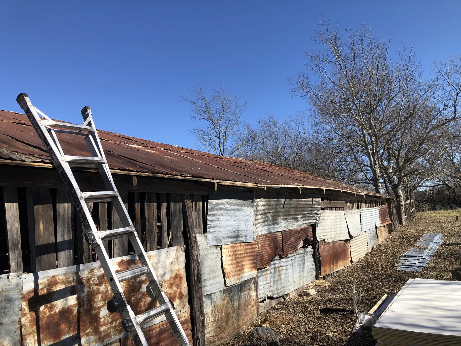 Before replacement: earlier roofing on the same home.