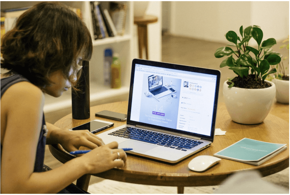 Person working on a laptop, reflecting focused preparation for interviews in emerging or niche roles, highlighting the importance of research, adaptability, and continuous learning.