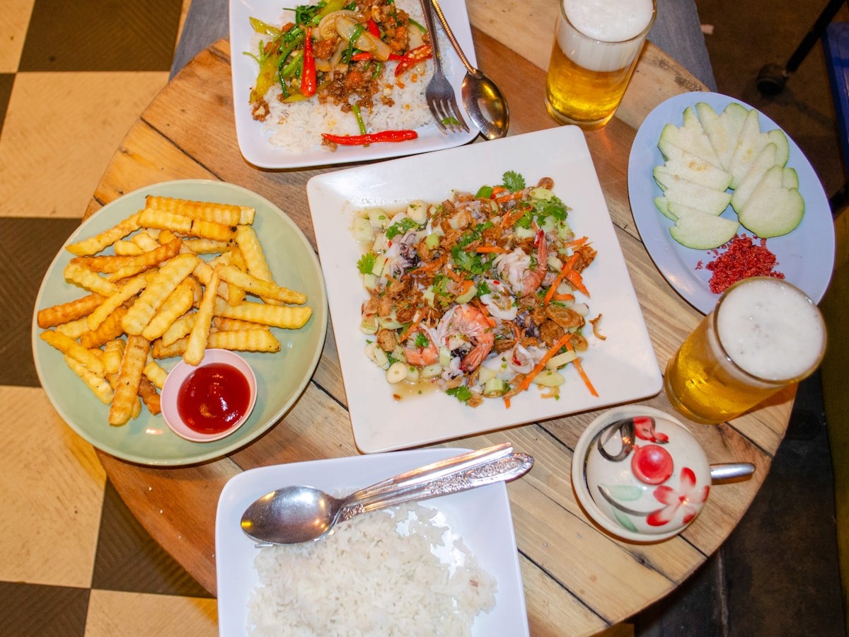 Vietnamese shared dishes on a restaurant table