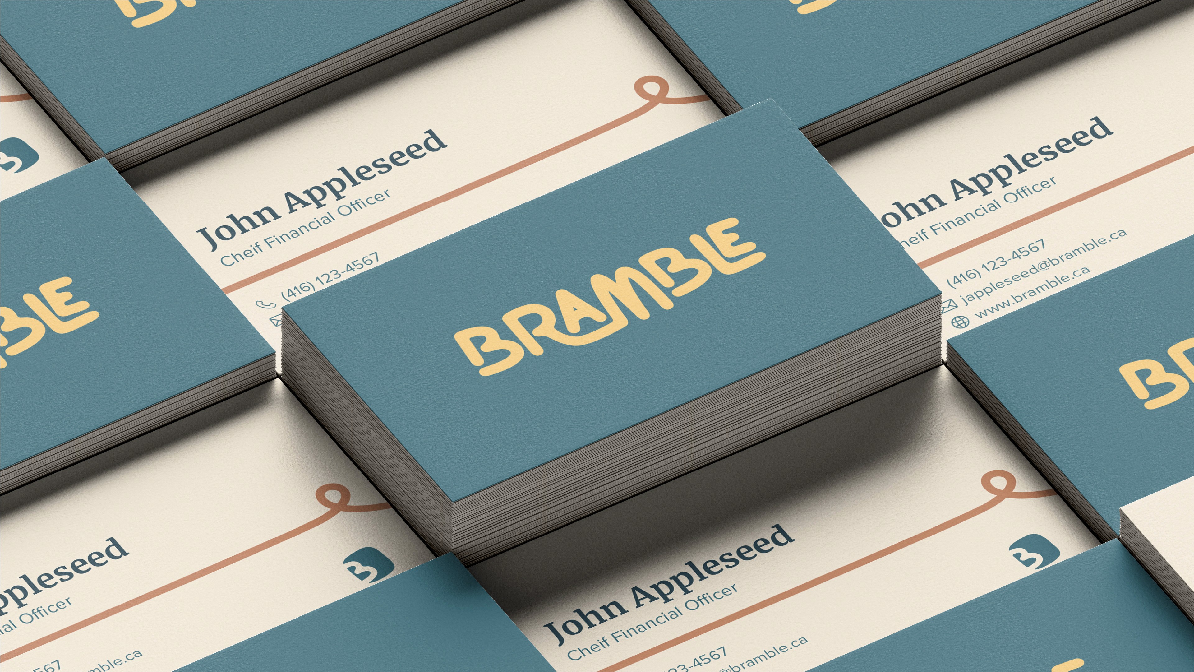 Gemini said A grid of professional business cards for the outdoor brand Bramble is displayed on a neutral surface, showcasing both the front and back designs. The front of the cards features the Bramble logo in a light orange, organic typeface centered on a textured teal background. The back of the cards uses a cream-colored background with a thin, loopy orange line running horizontally across the center. This side includes contact details for John Appleseed, the Chief Financial Officer, including a (416) area code phone number, a company email address, and the bramble.ca website URL.