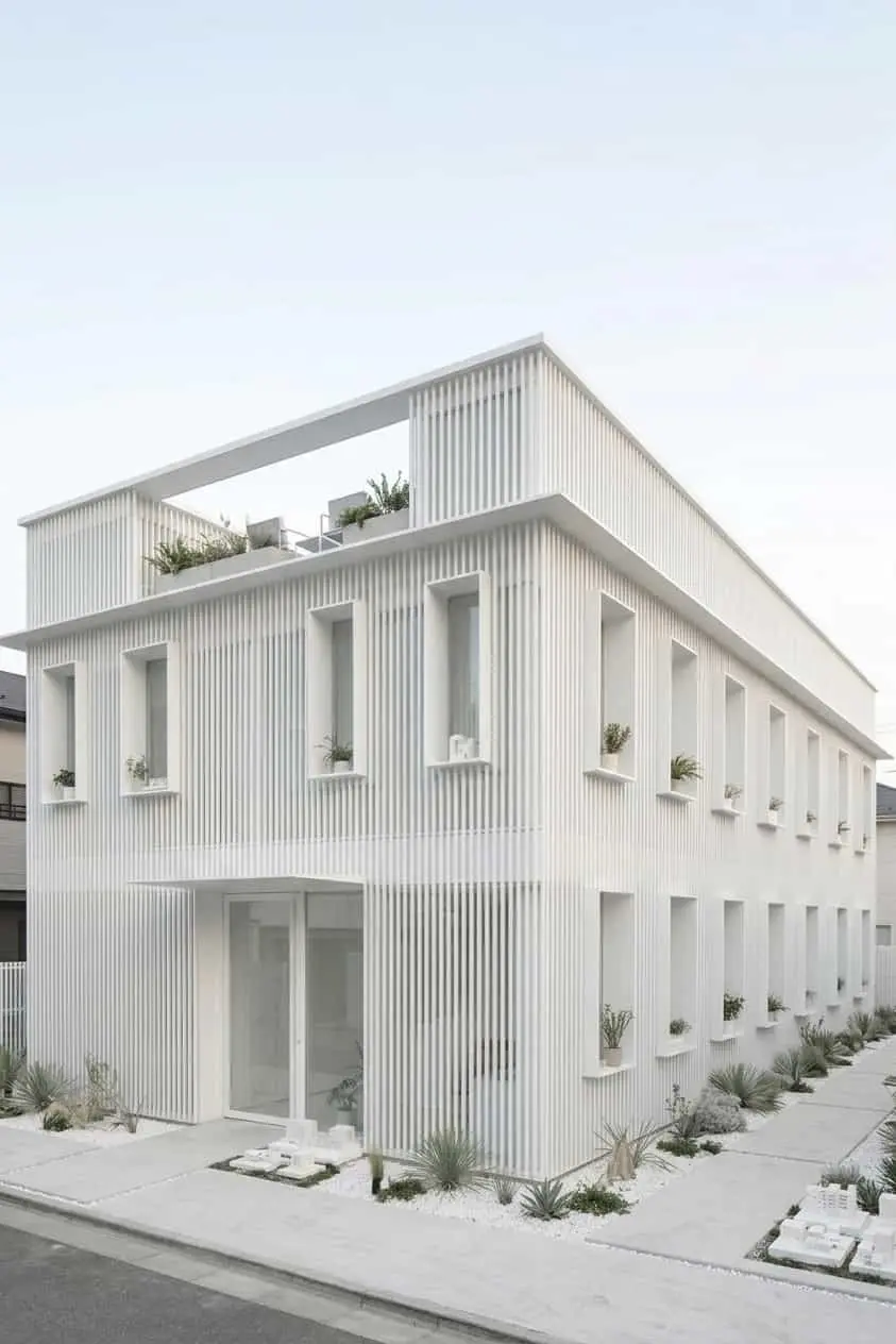 White ribbed architectural interior beneath a skylight