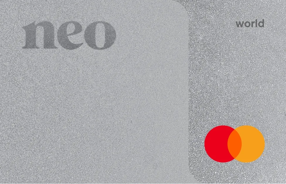 A close-up of the silver Neo World Mastercard, a zero-fee cash-back Canadian credit card recommended for newcomers looking to build their credit score.