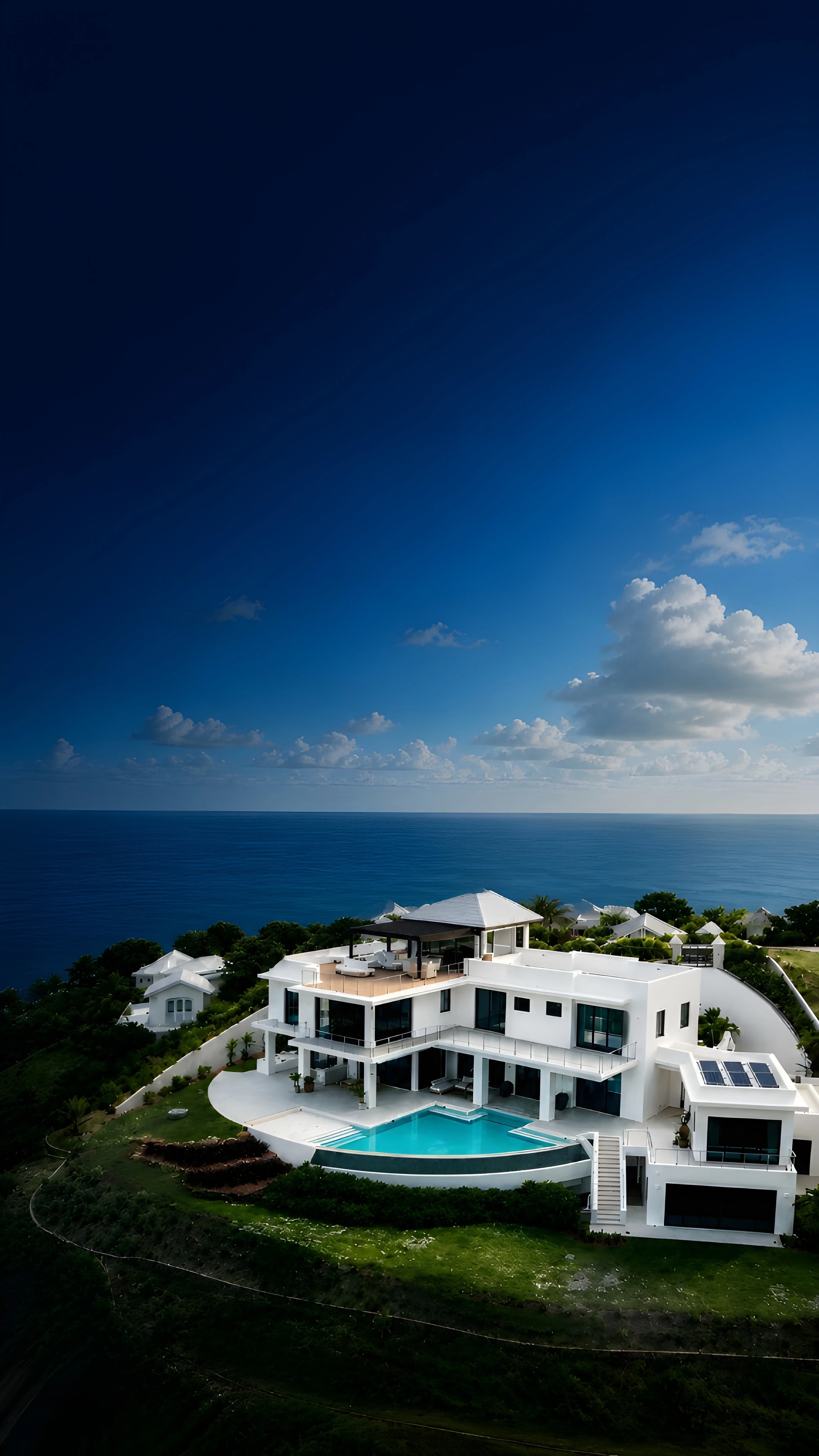 Aerial view of the Devaux Residence, a modern luxury home with infinity pool designed by Atelier International on a cliffside in Saint Lucia overlooking the Caribbean Sea