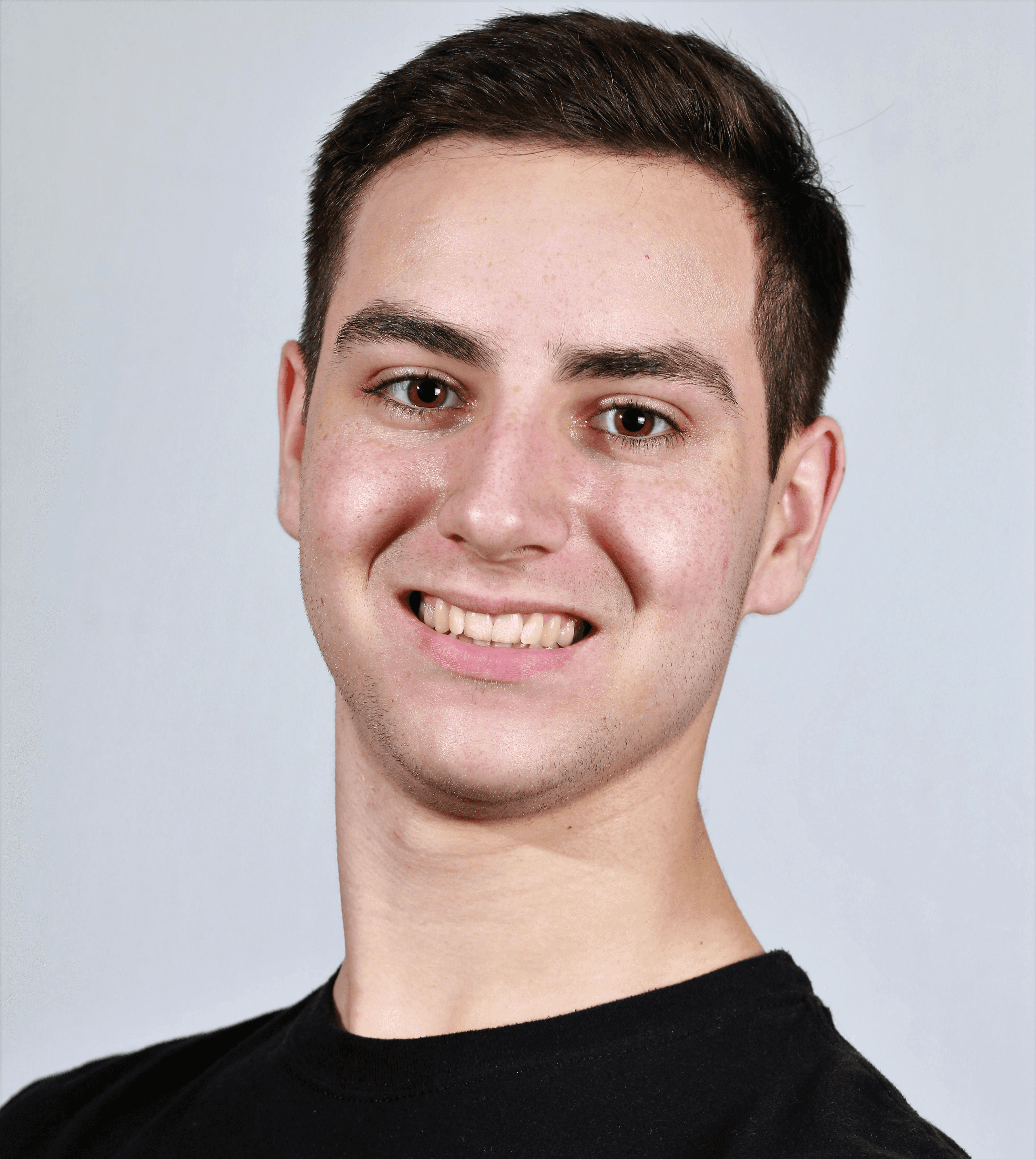 man in black crew neck shirt smiling