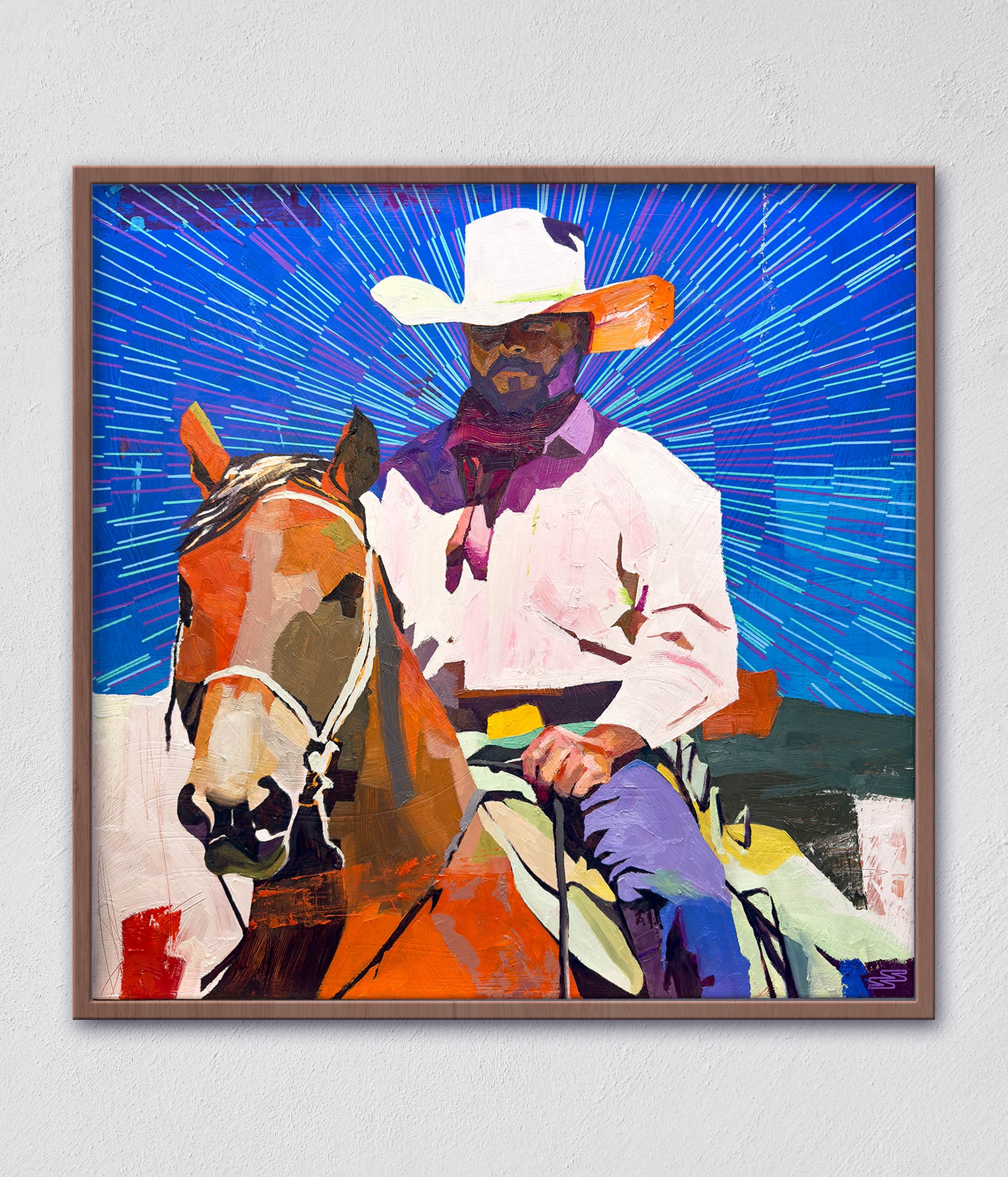 A painting of a cowboy riding a horse in a wooden frame