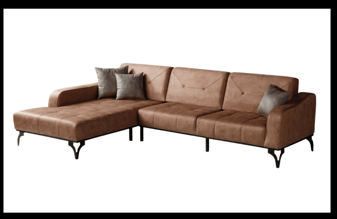Tan suede sectional with tufted seats and black metal legs.