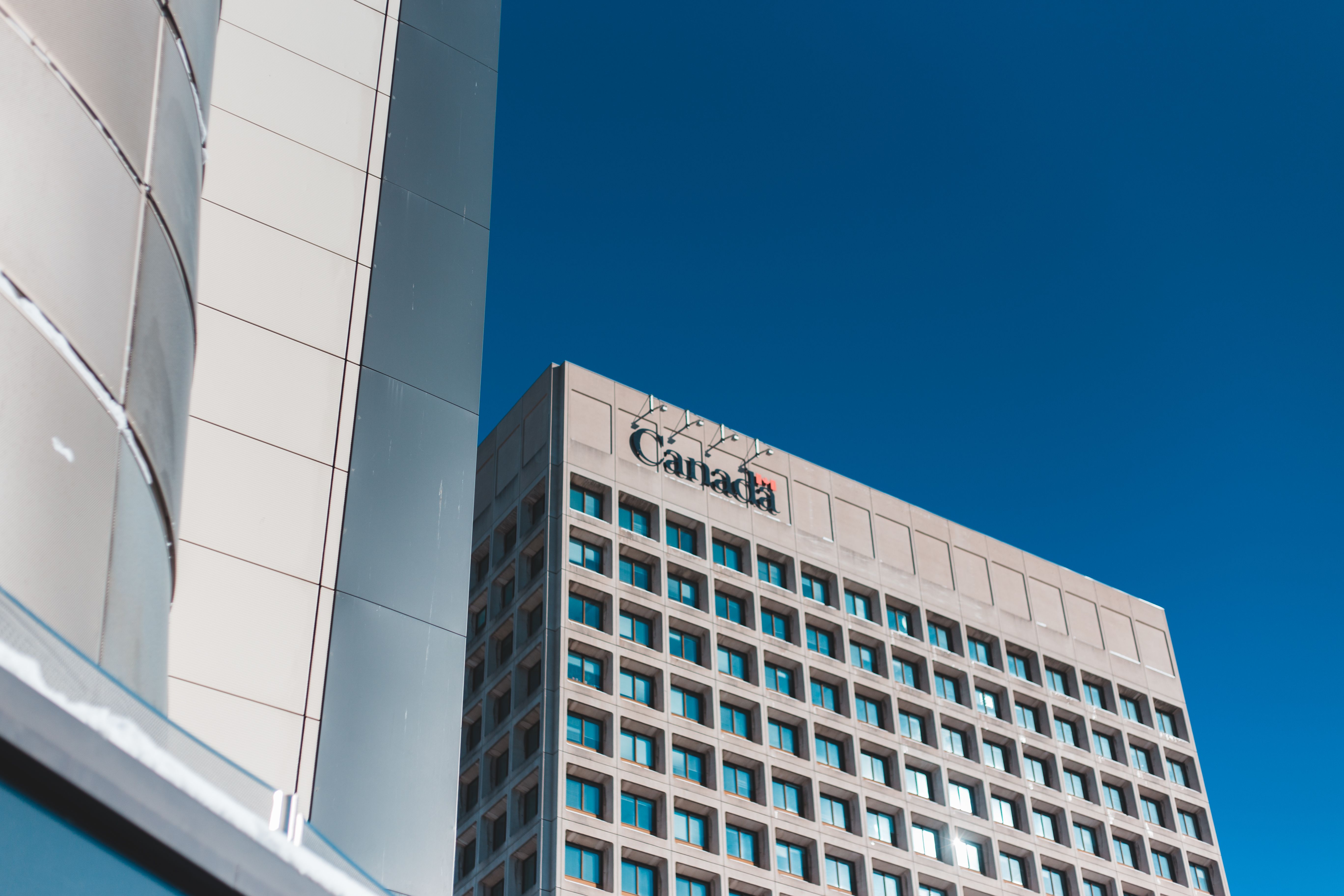 black and gray high rise building under blue sky during daytime