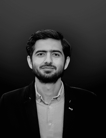 woman in black blazer standing