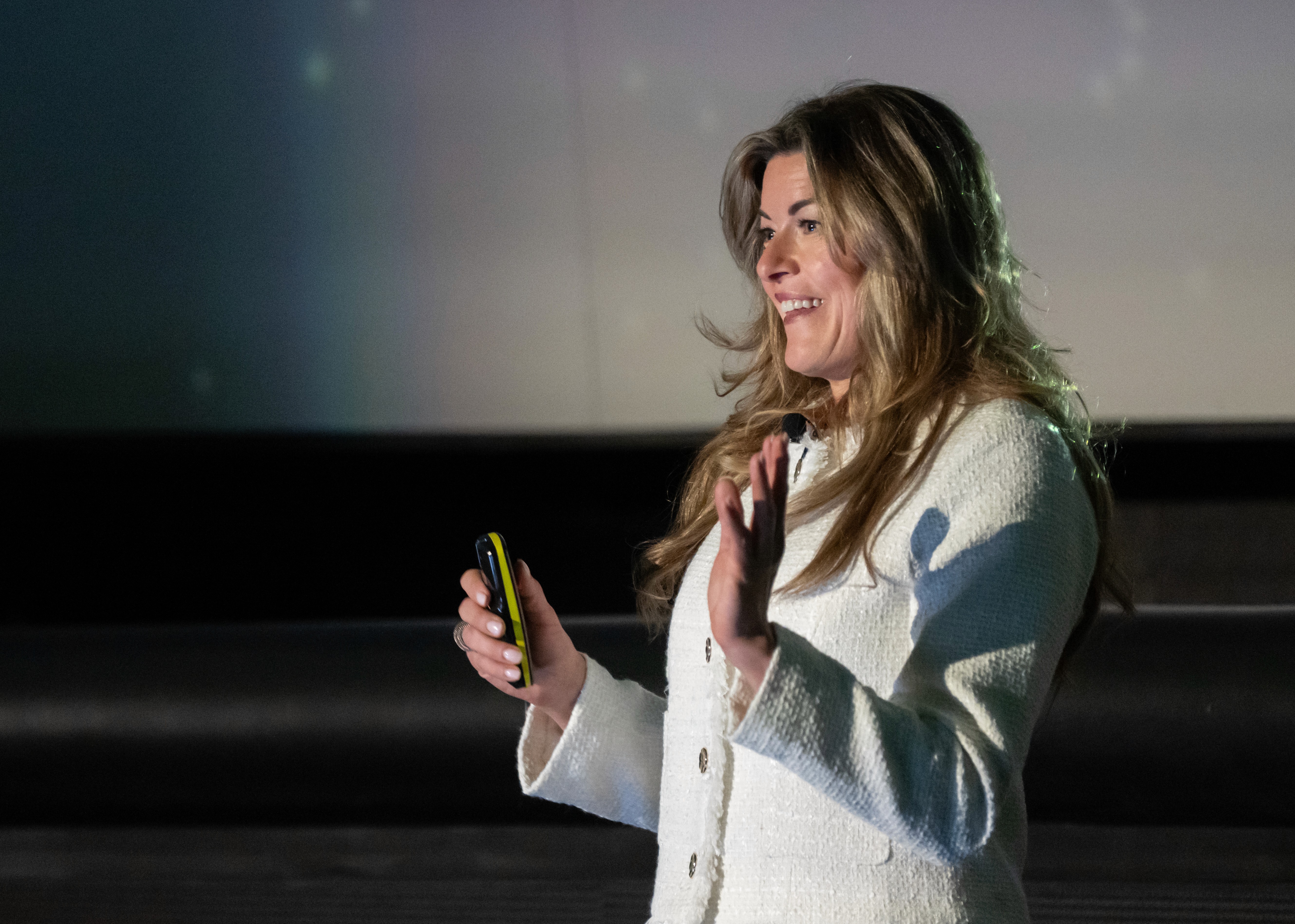 Jennifer Lea speaking on stage