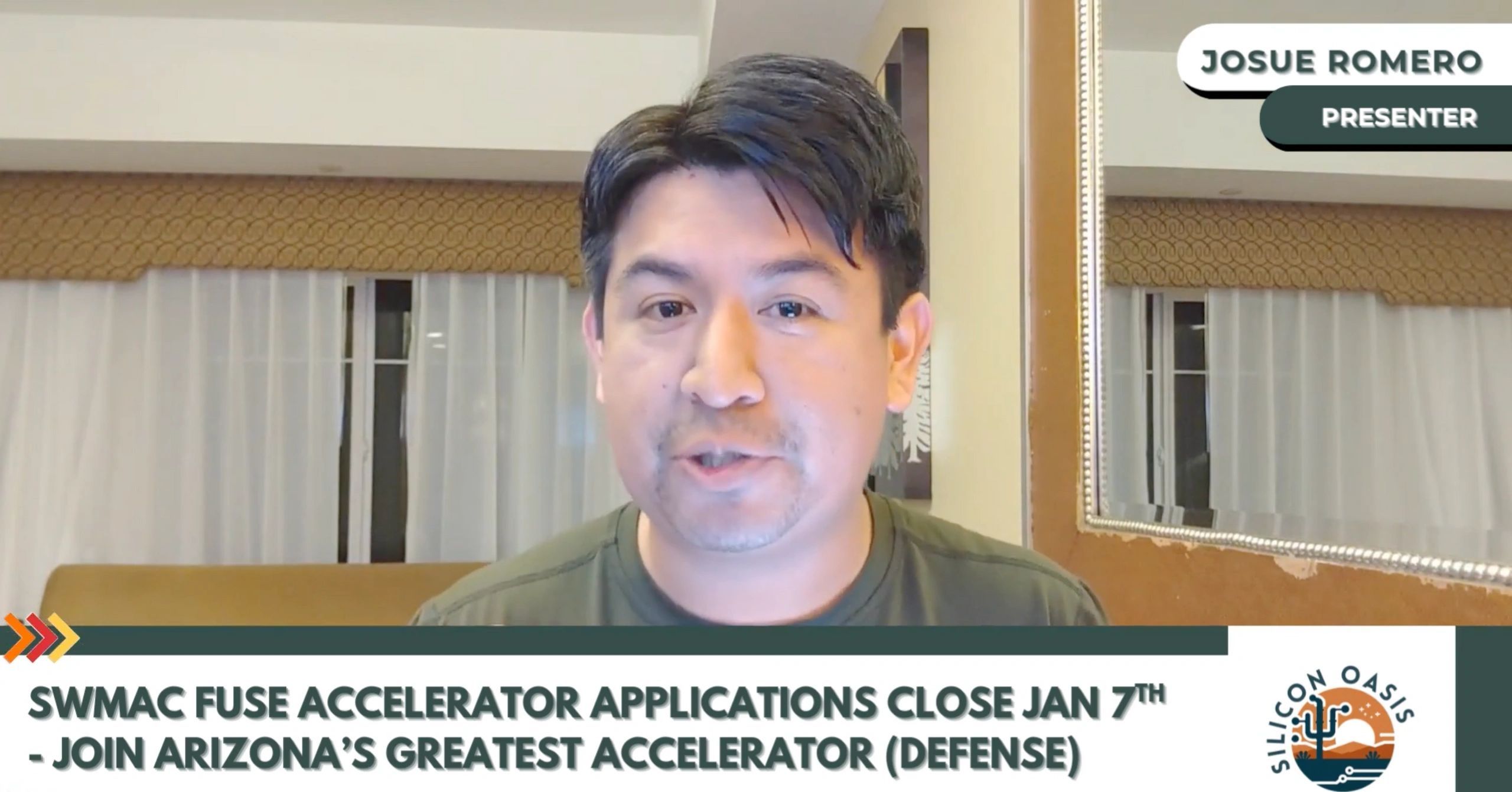 a black and white living room with a large tv