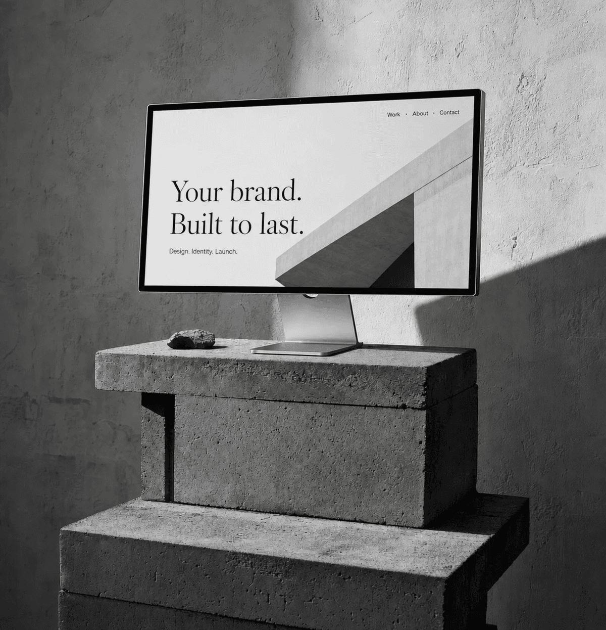 Minimalist brushed-steel chair in a white corner studio—industrial, brutalist modern furniture.