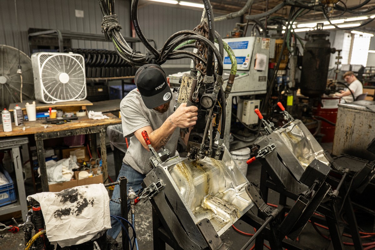 PURforms employee filling mold