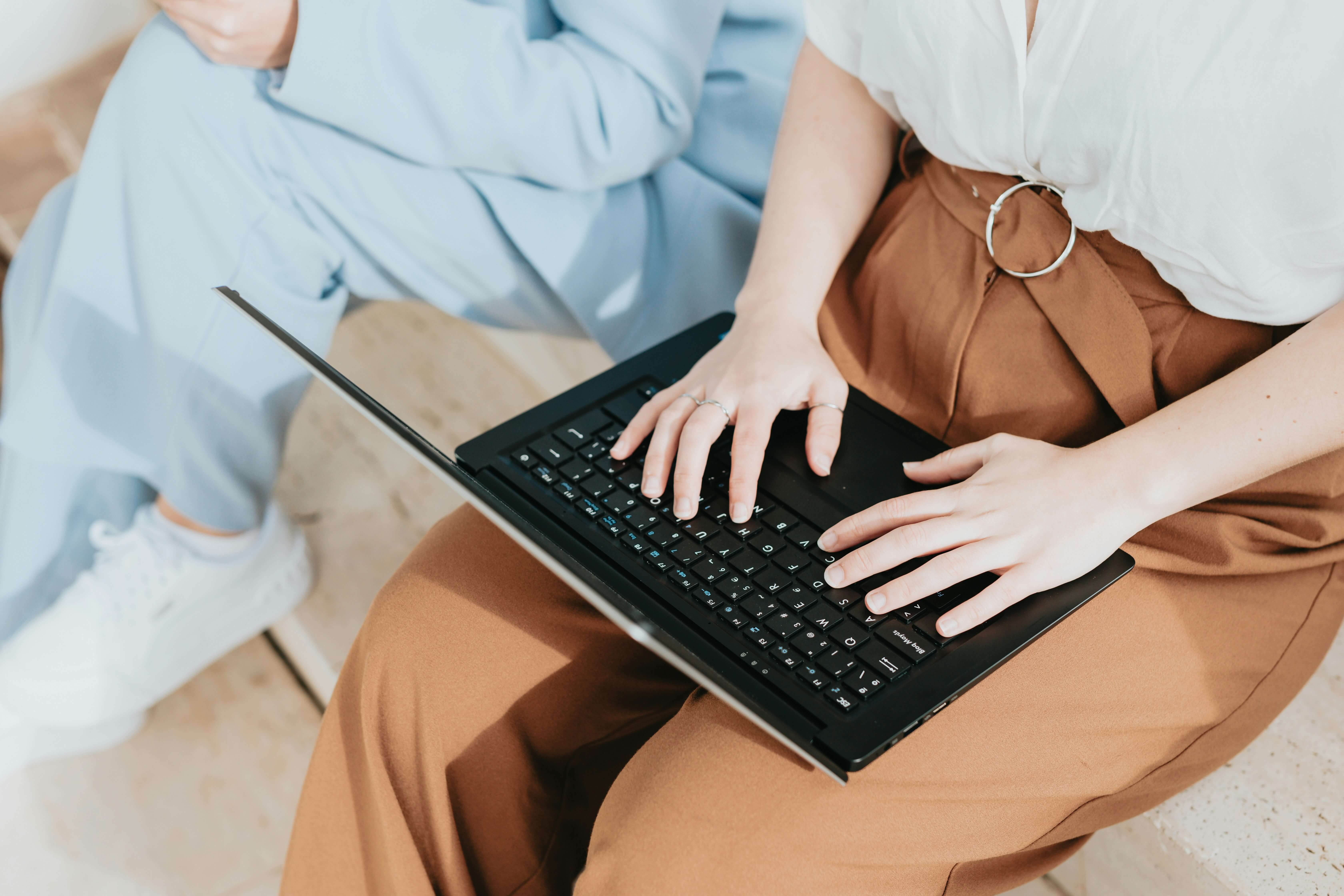 woman sitting at computer