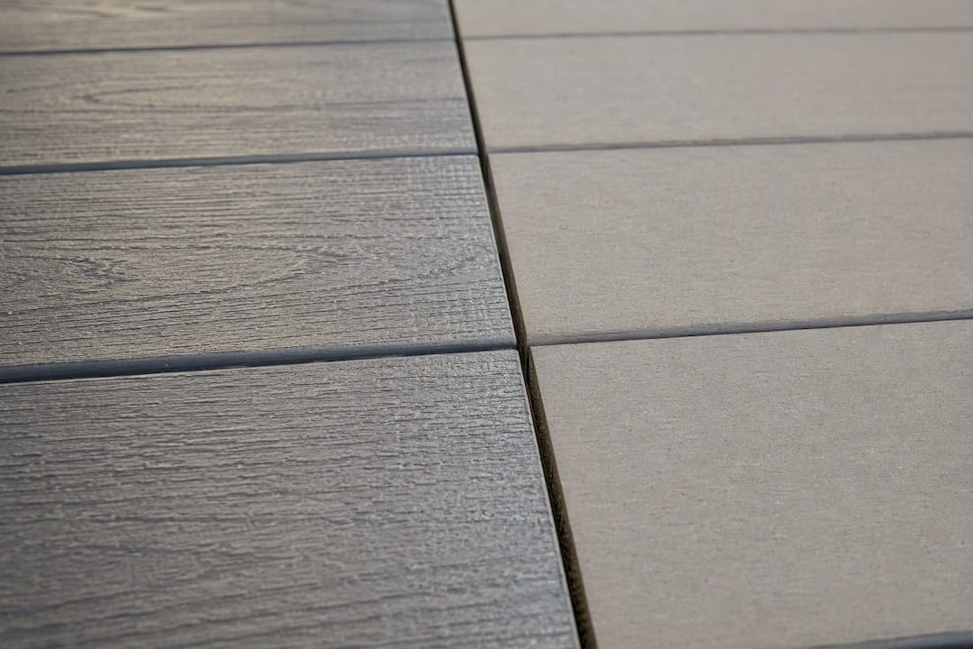 Close-up of capped and uncapped composite decking textures