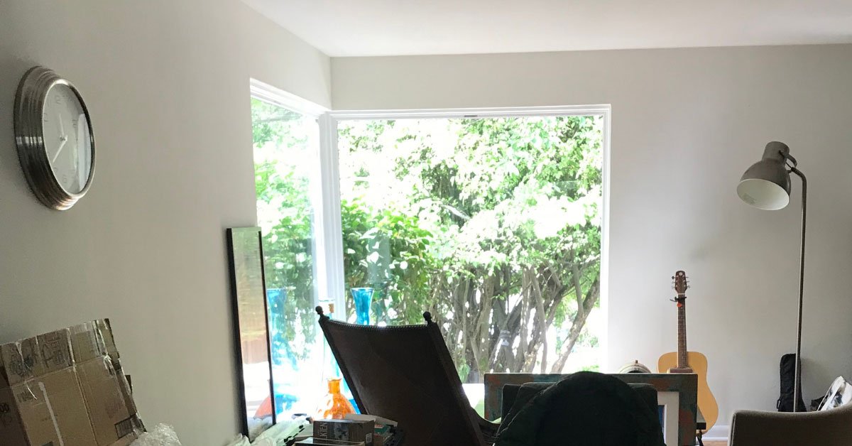 Before photo of this living room in the Sandpoint House by Elegant Simplicity, Bellevue, WA