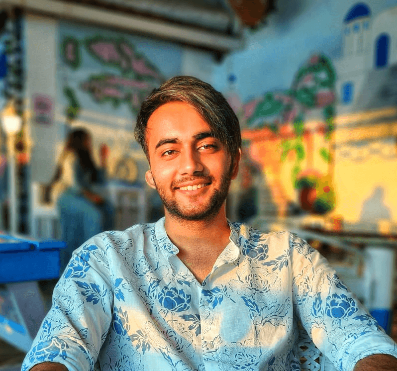 A portrait of a young man smiling