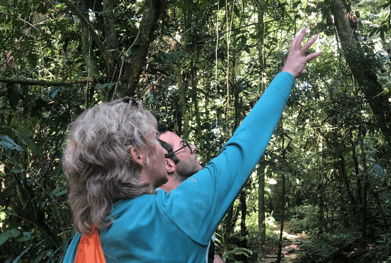 Woman drinking a dark beer in a brewery