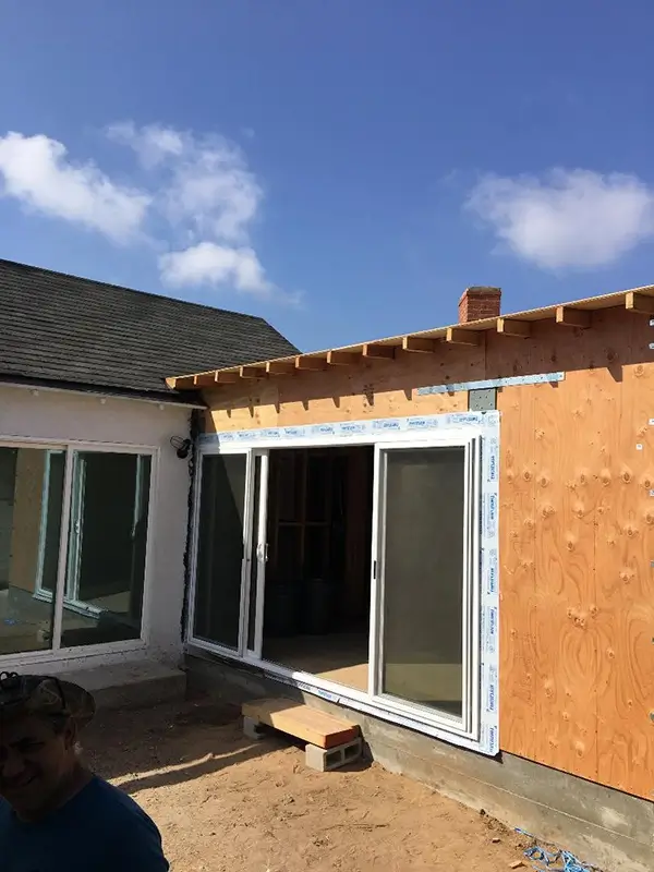 red rose on notebook near MacBook