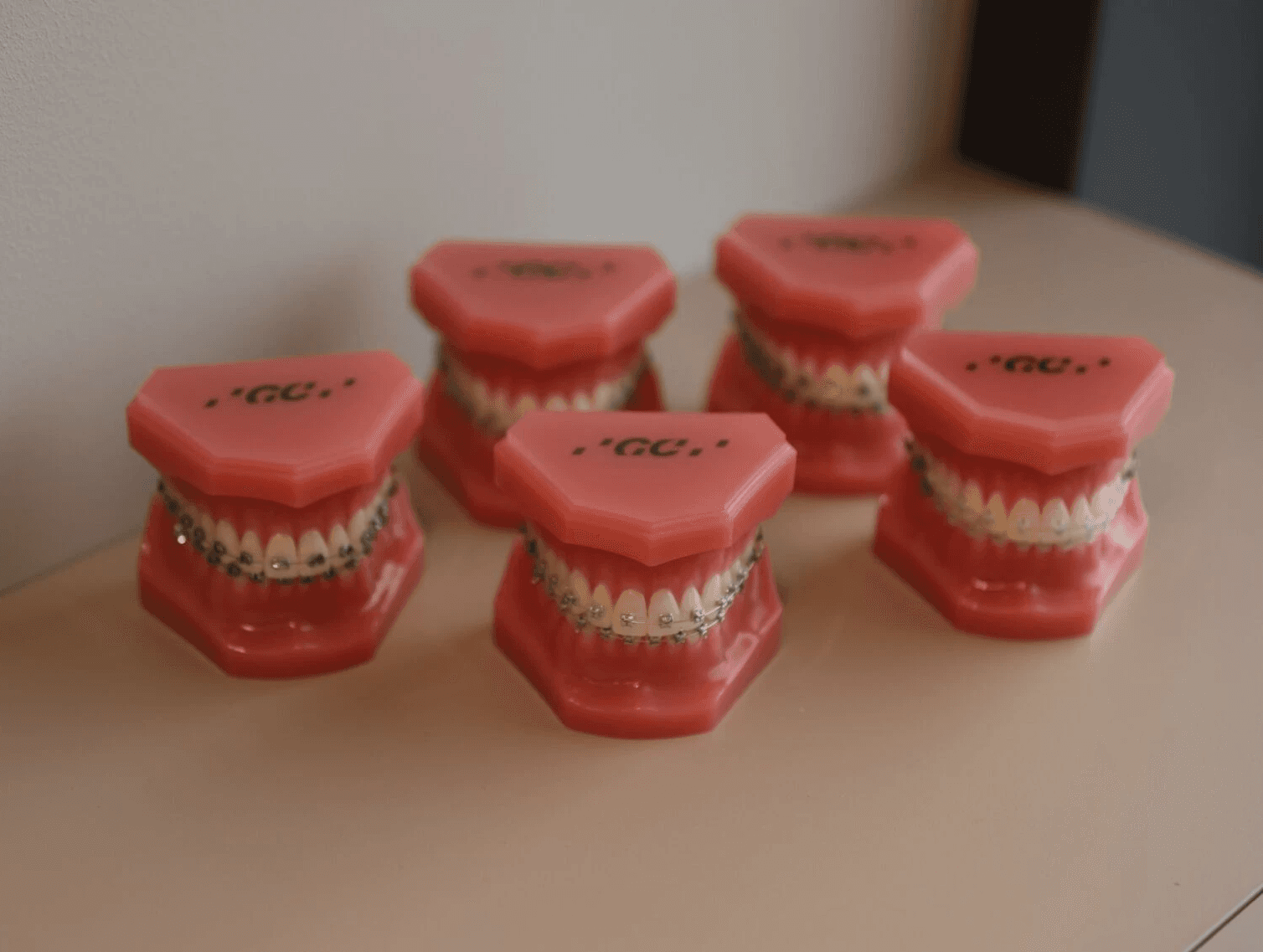 white and brown ceramic cake figurine