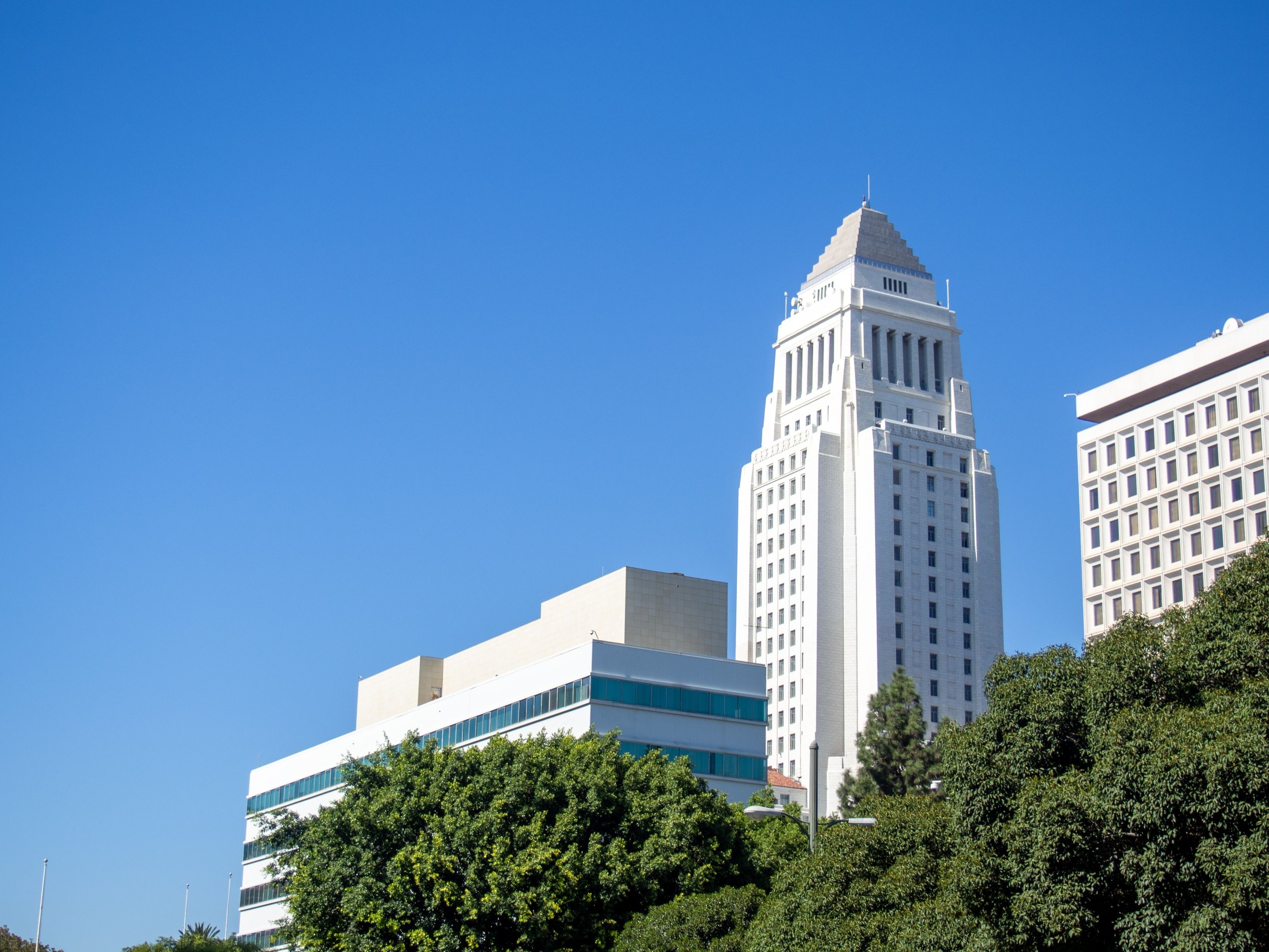 Los Angeles City Hall, where many apartment building regulations and policies shape the local multifamily market