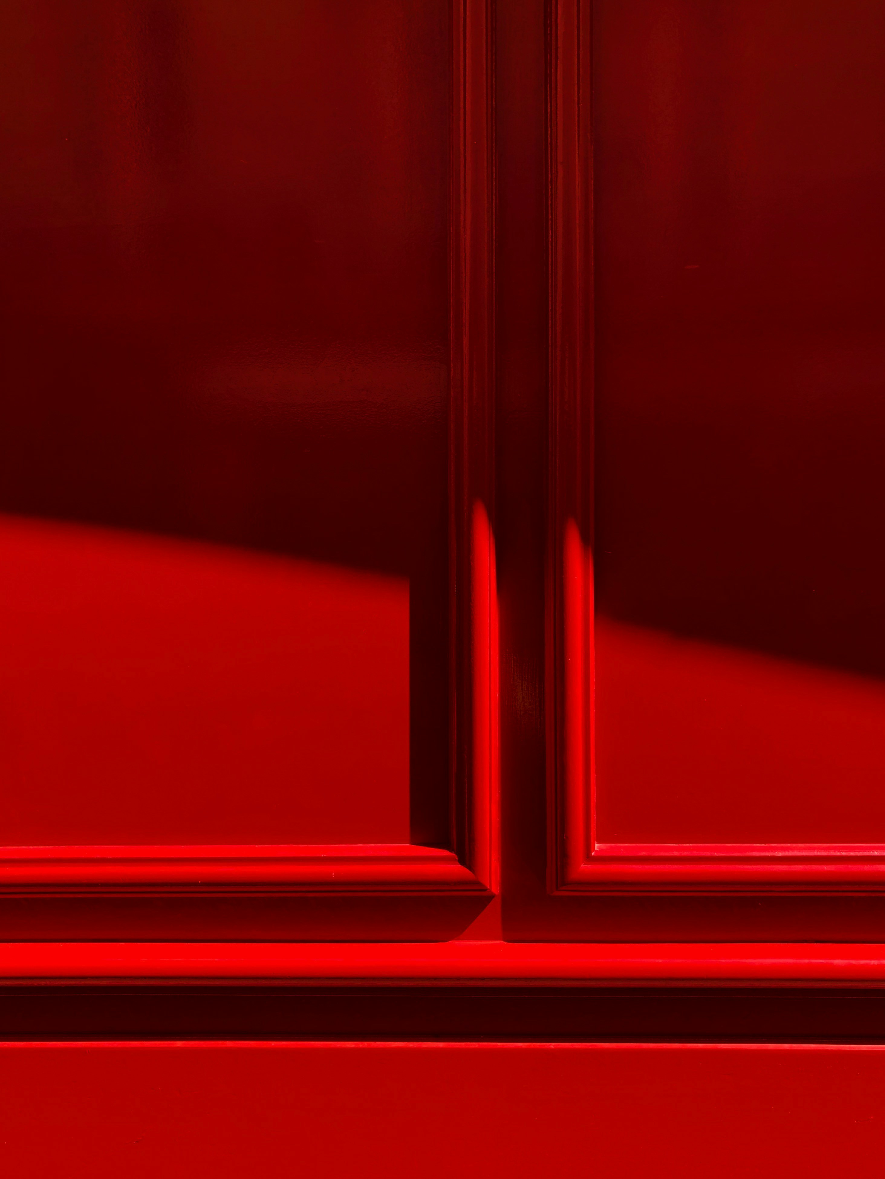 a close up of a red door frame