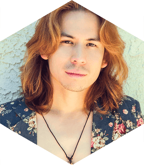 The Pink Door Lounge in dim blue light with aerial performer