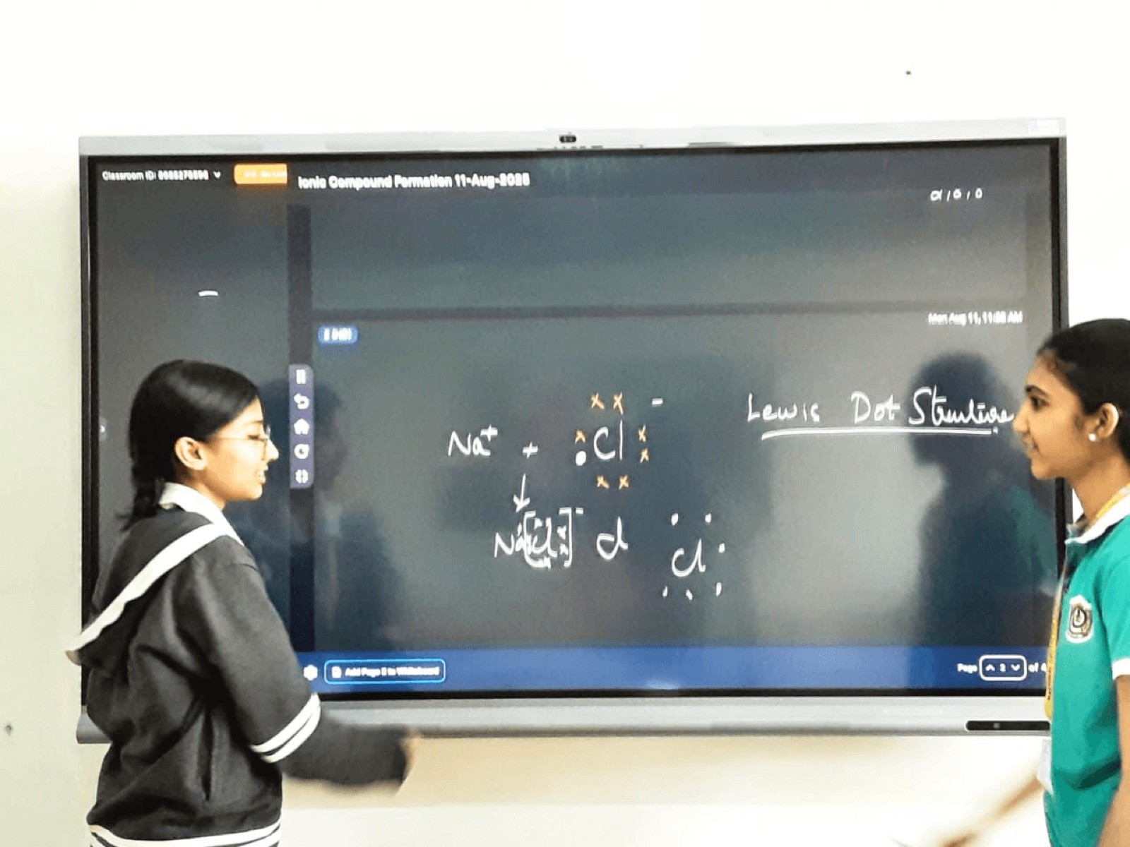 NCFE children interacting with a touchscreen smart board during interactive learning