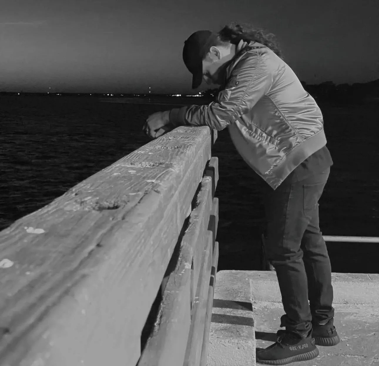 Alone on the pier at dusk