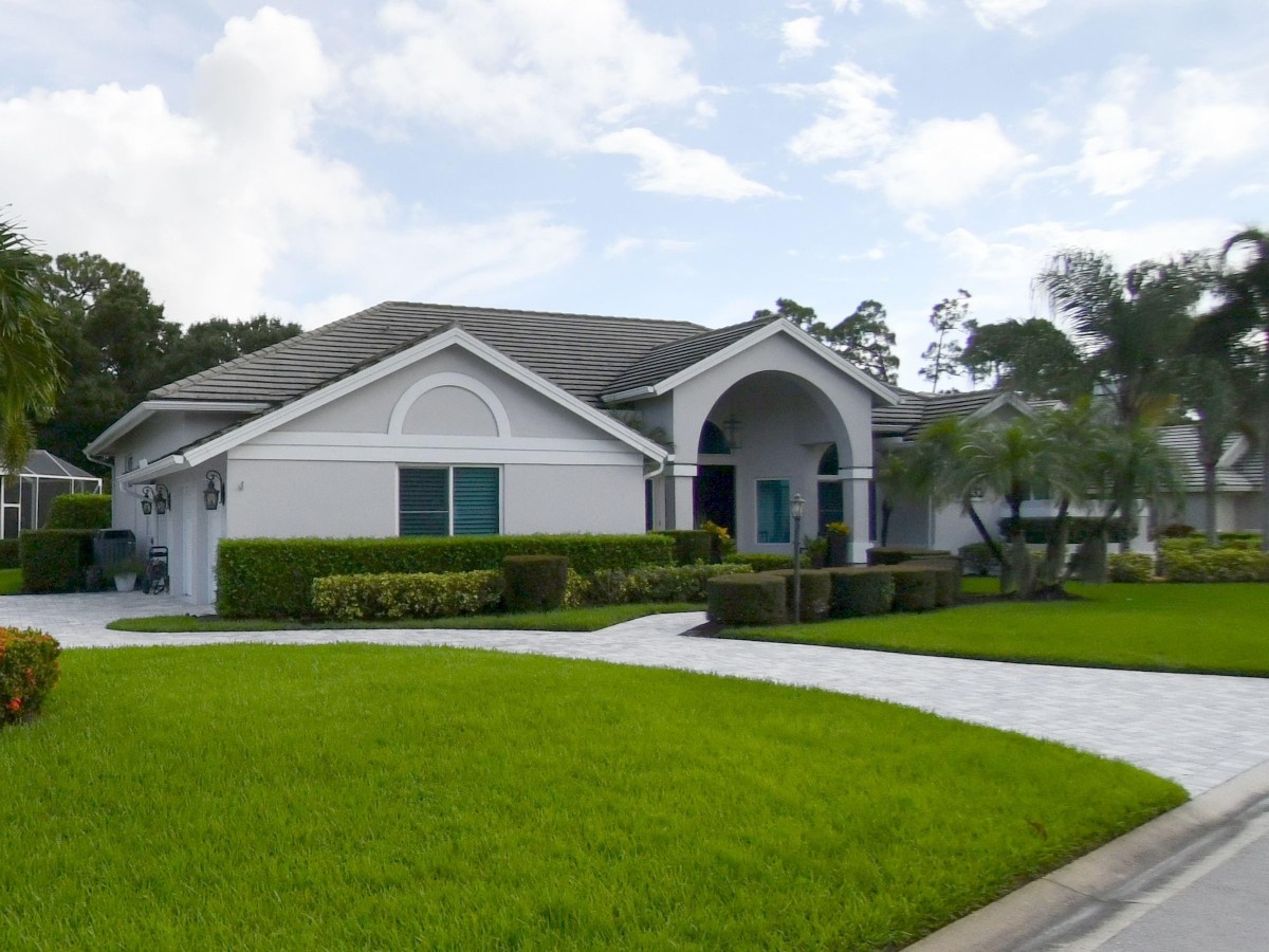 1994 New Roof Construction in Calloway Place, PGA Village, Port St Lucie with Entegra Flat Broomswept Tile in Natural Gray