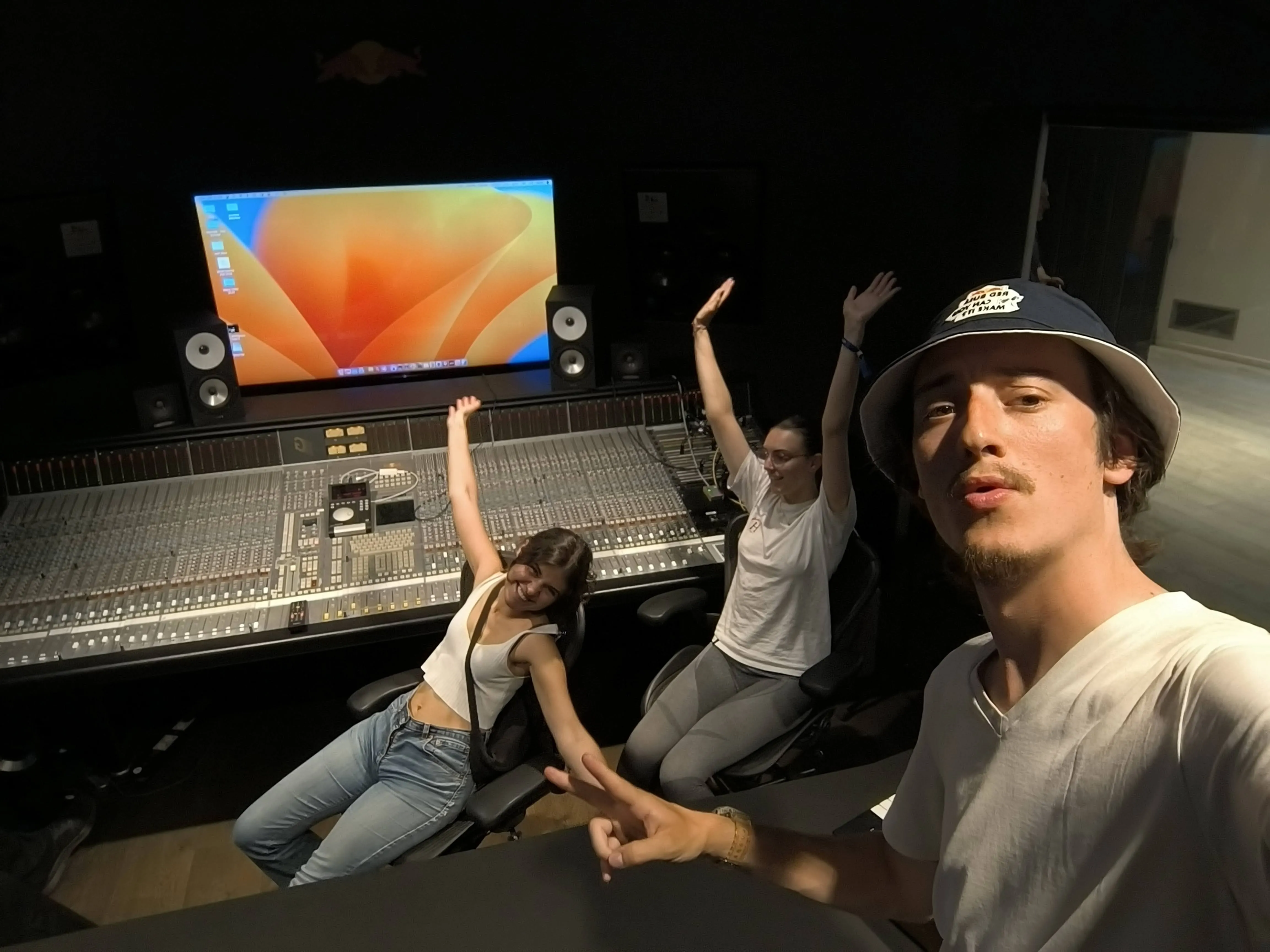 Three people in the Redbull music studio in Berlin