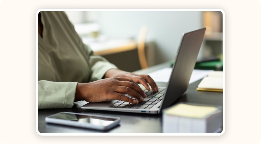 Person typing on a laptop