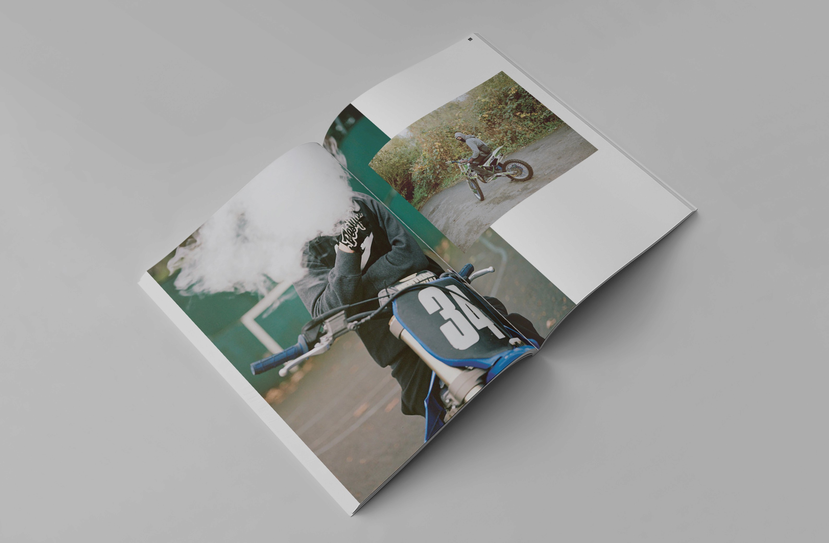 A lifestyle magazine spread featuring a person on a dirt bike exhaling vapor, with vibrant imagery of outdoor nature.