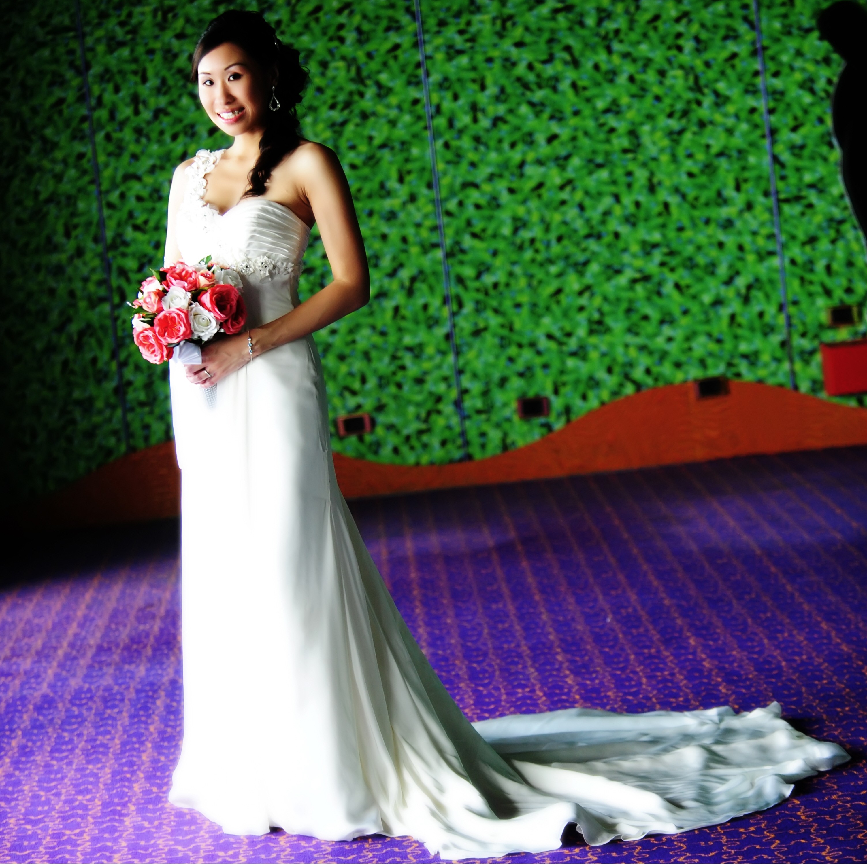 Asian bride in white gown holding bouquet — wedding photographer Duluth GA