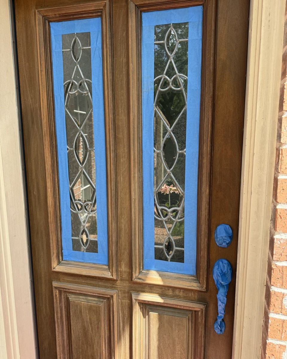 Before: Front door refinished in a rich dark stain