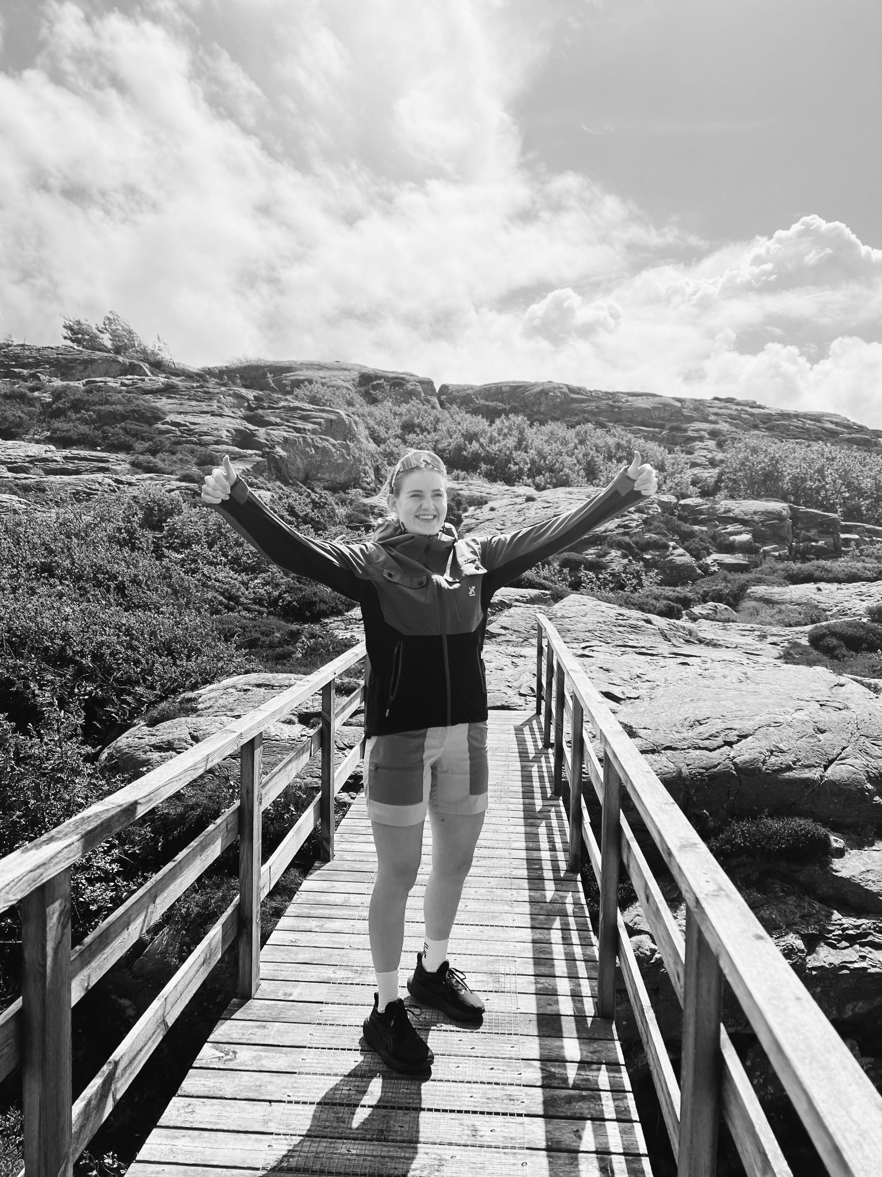 A monochrome full-body image of me when I'm out in nature on a hike.