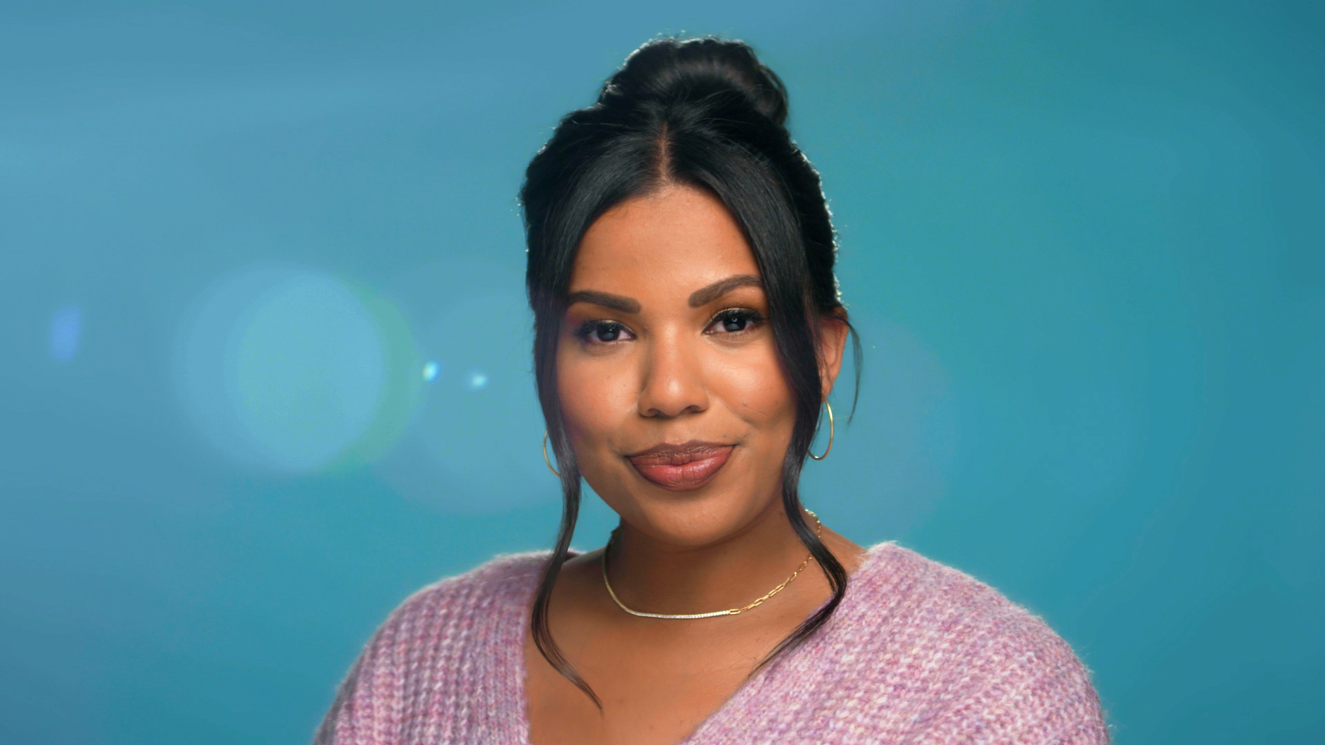 Tyla-Lauren Gilmore in a glowing medium shot