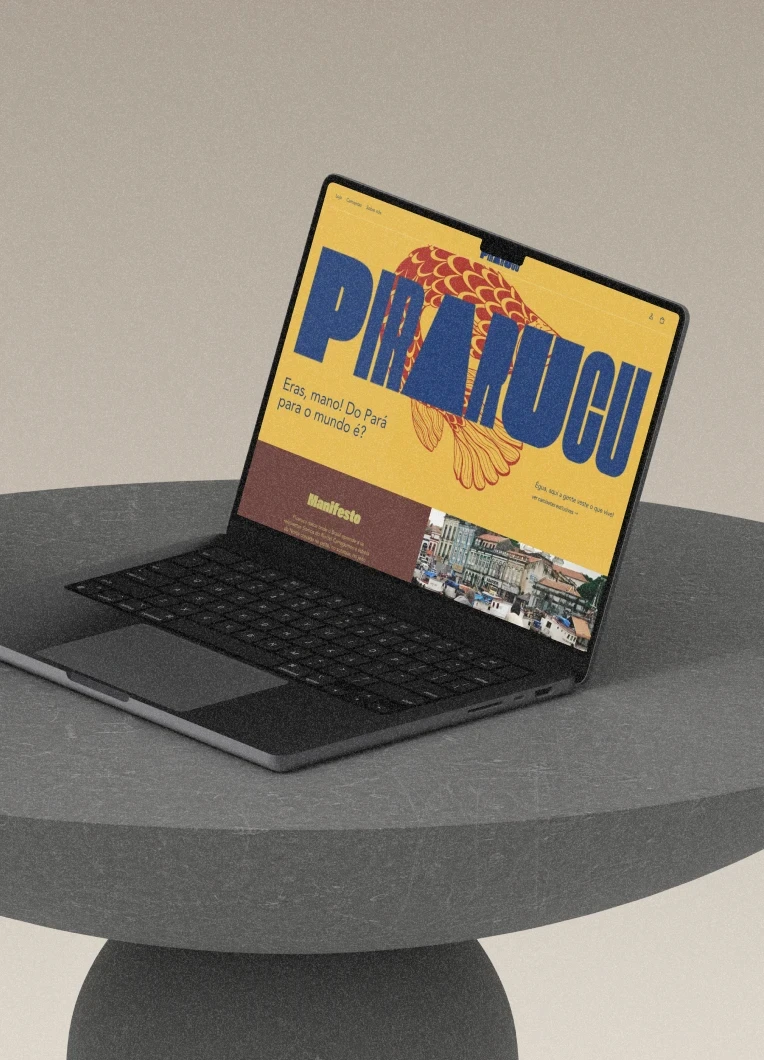 Mockup de e-commerce desenvolvido pela Milan Design Studio para Pirarucu, marca de moda do Norte do Brasil, com identidade visual maximalista e cultural.