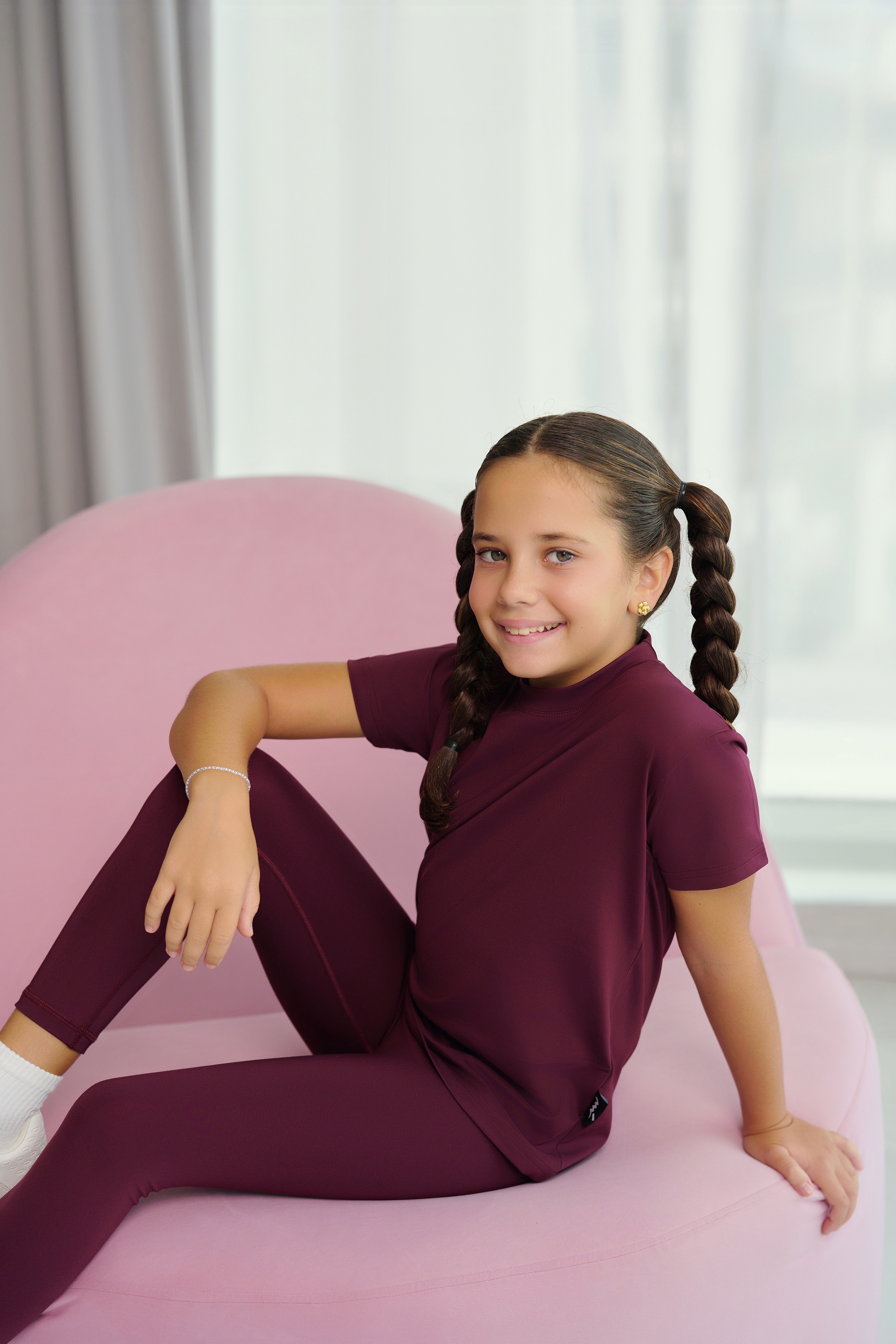 Friends laughing and posing inside a car