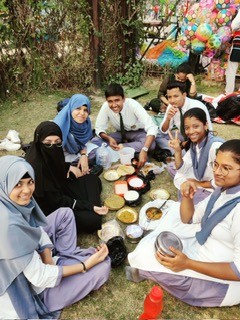 Students celebrating Eid with family and school community