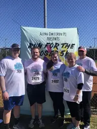 man in black hoodie standing