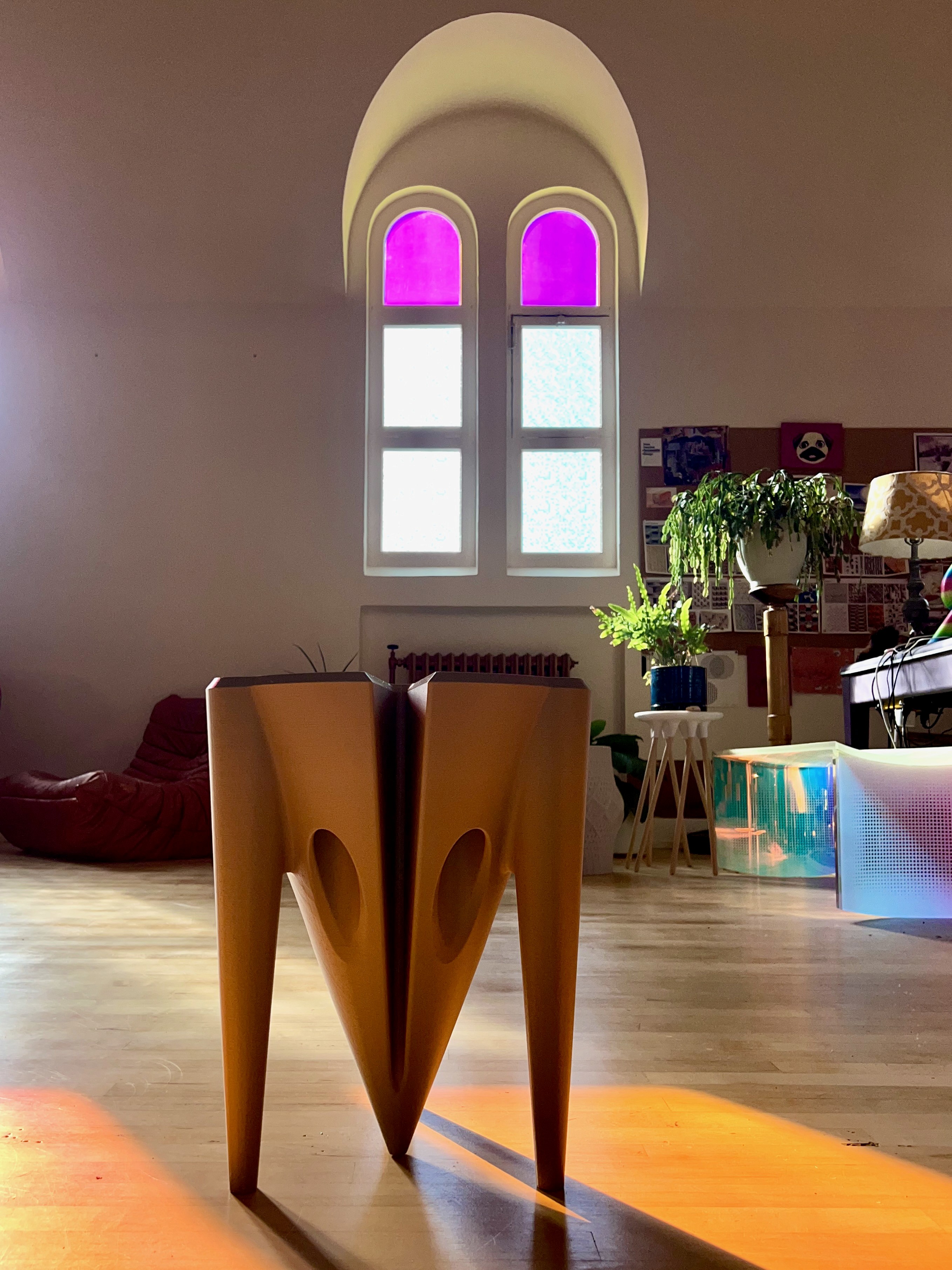 Sculptural black 3D-printed furniture form