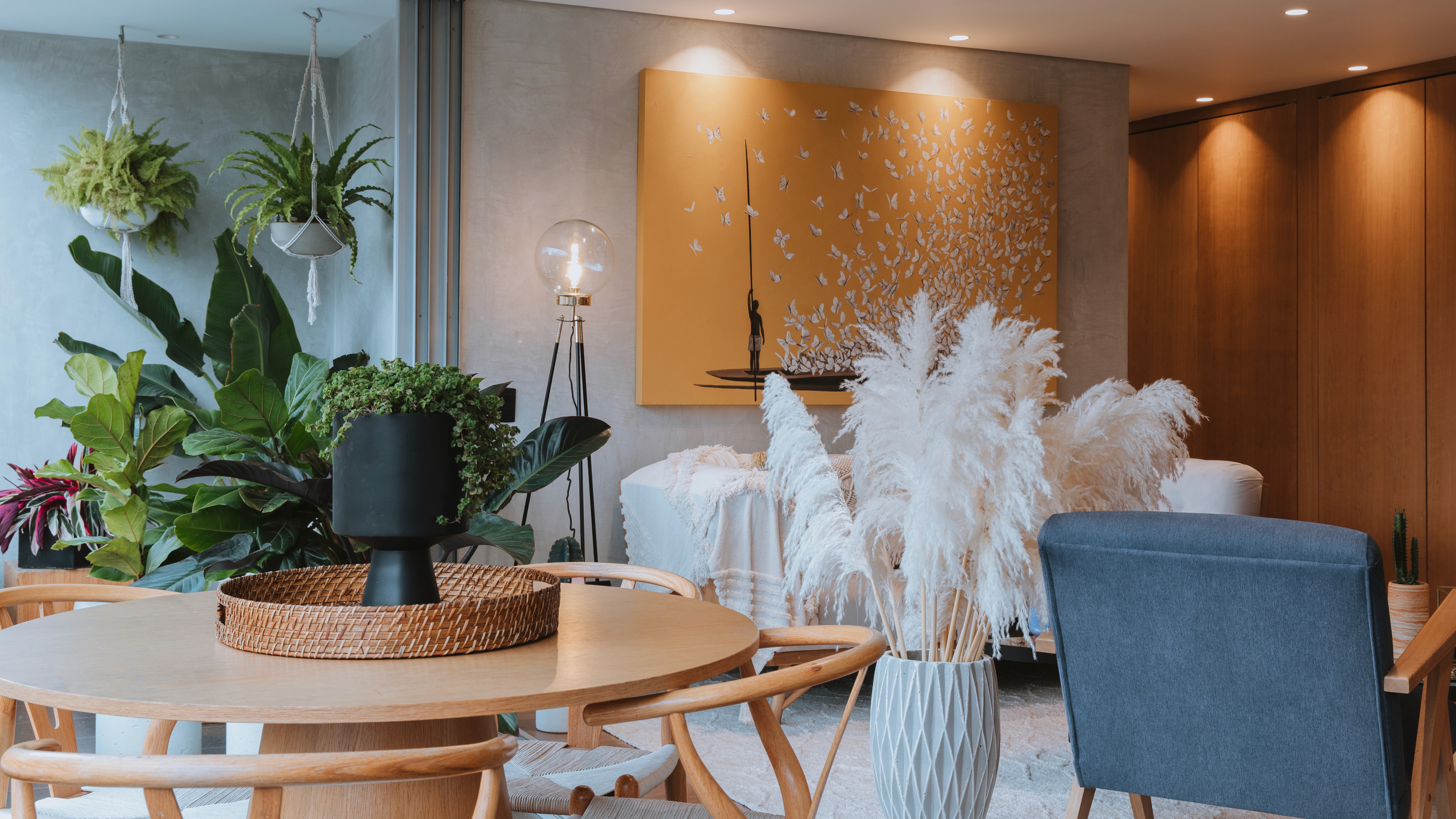 Double-height interior with flowing sculptural forms and warm raking light