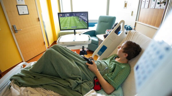 Patient at Children's Colorado gaming on a GO Kart.
