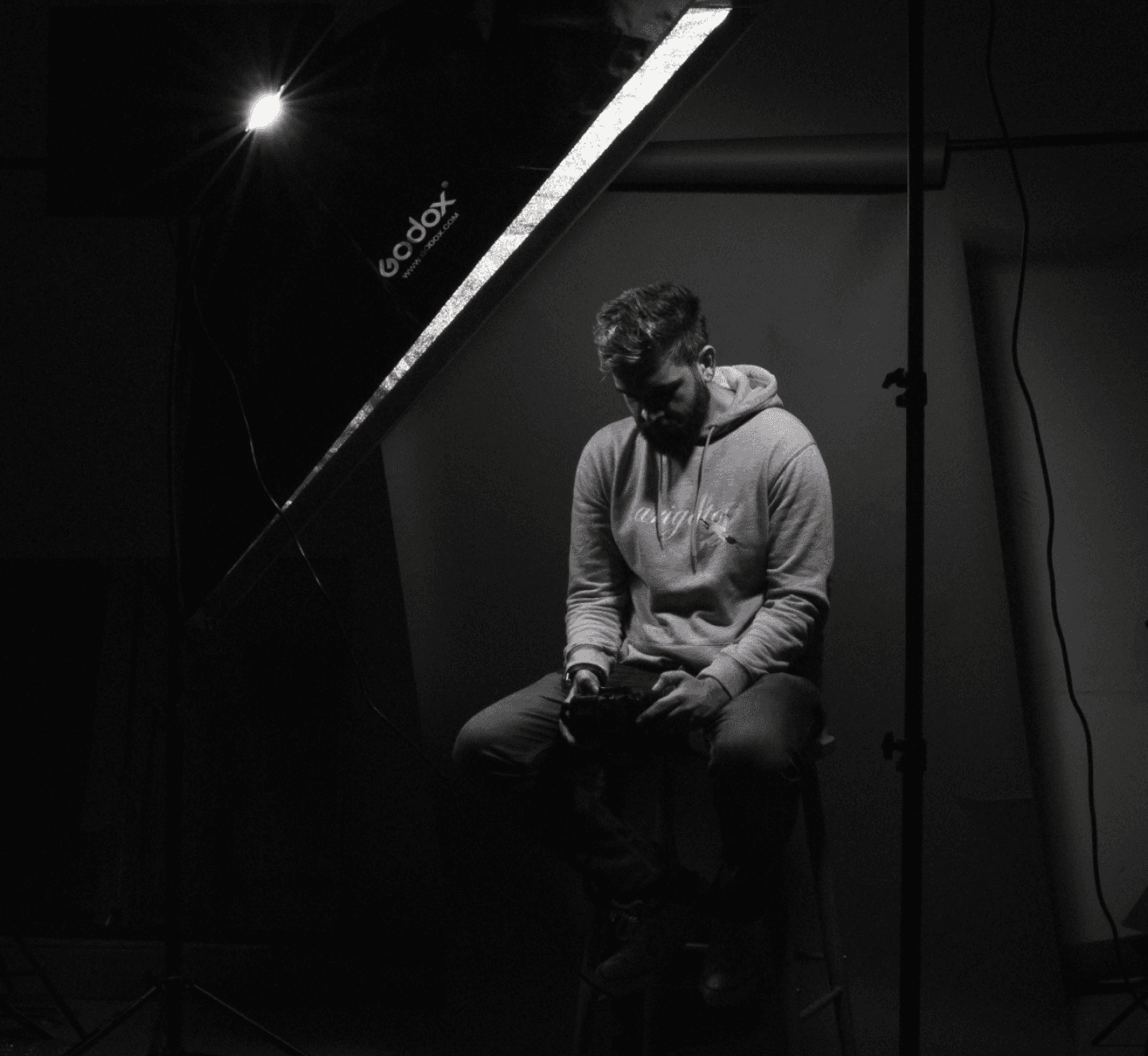 man sitting in a studio