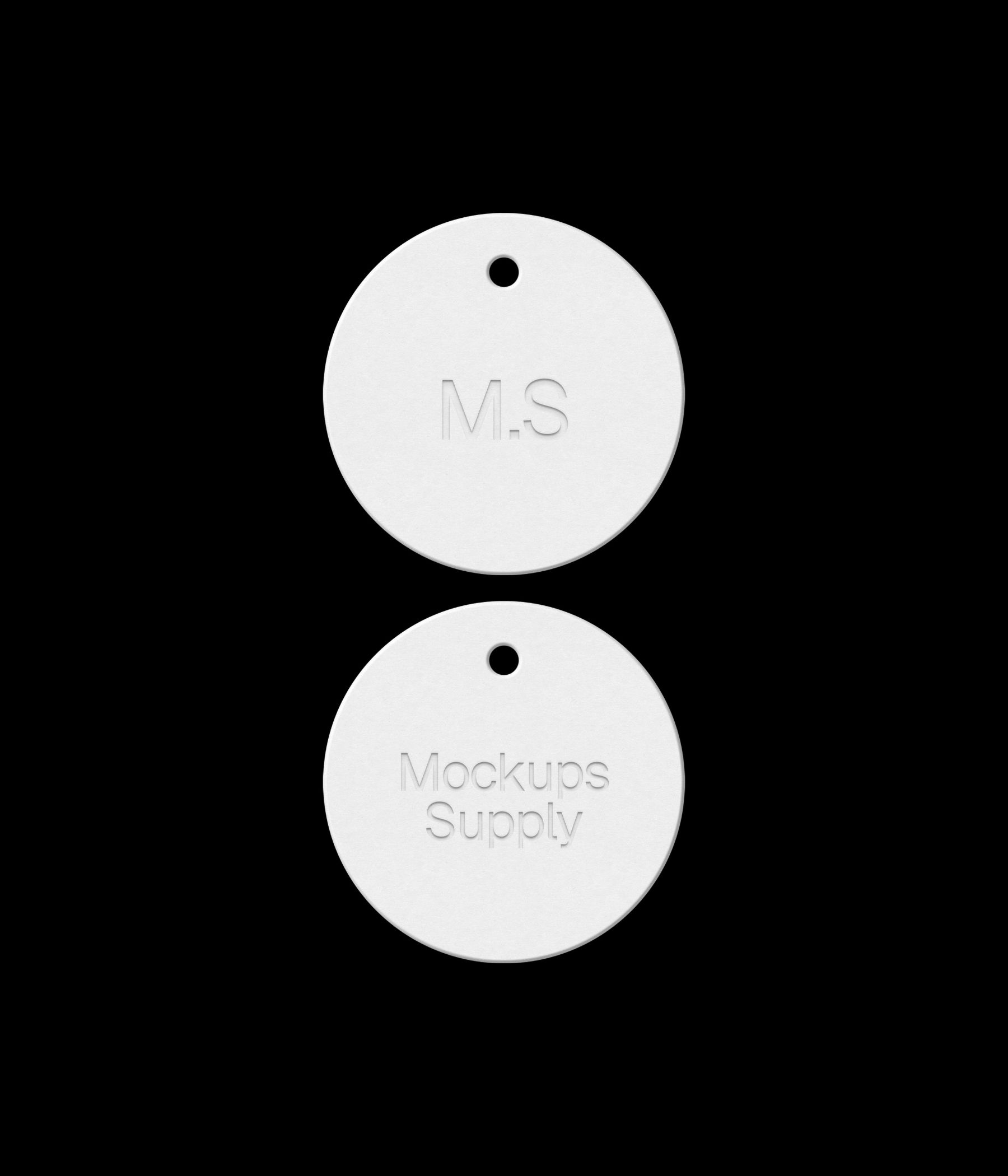 Two round white hang tags mockup on black background with debossed text effect for Photoshop download psd